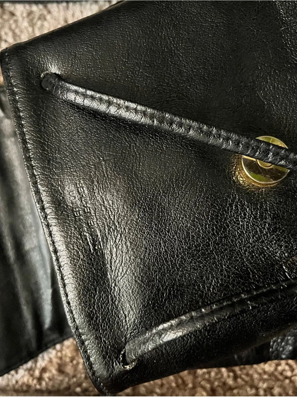 JJs House Black Leather Drawstring Flap Backpack